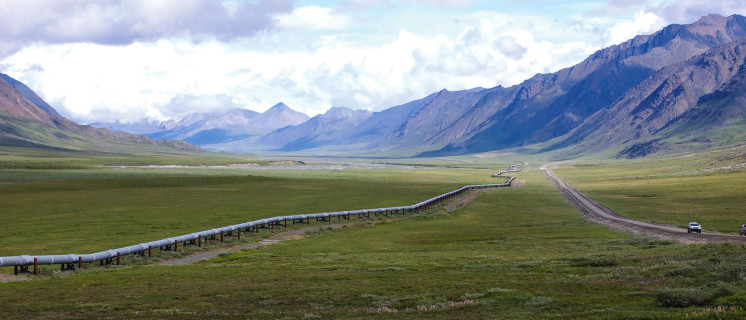 Trans-Alaska Pipeline, northern Brooks Range, Alaska. Rocks in the background produce oil on the North Slope.